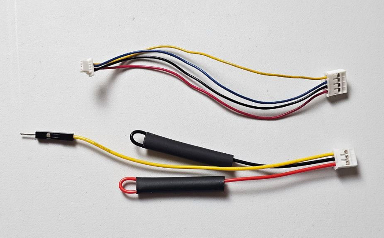 Original Grove-to-STEMMA QT cable and Sensors AD cable before the SCL contact is moved into the AD position