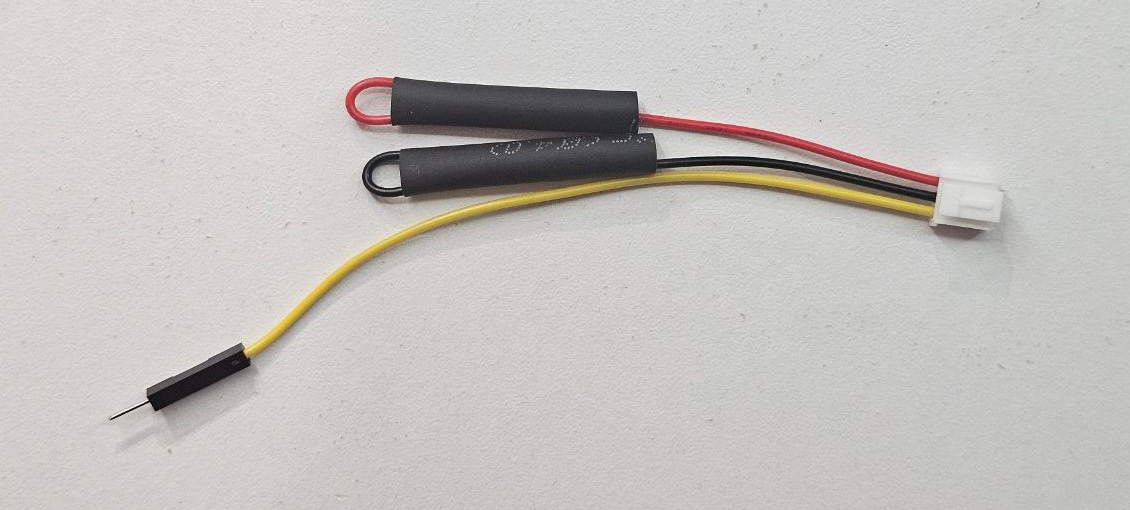 Three-pin Sensors AD cable with its unused red and black contacts insulated separately with heat-shrink tubing